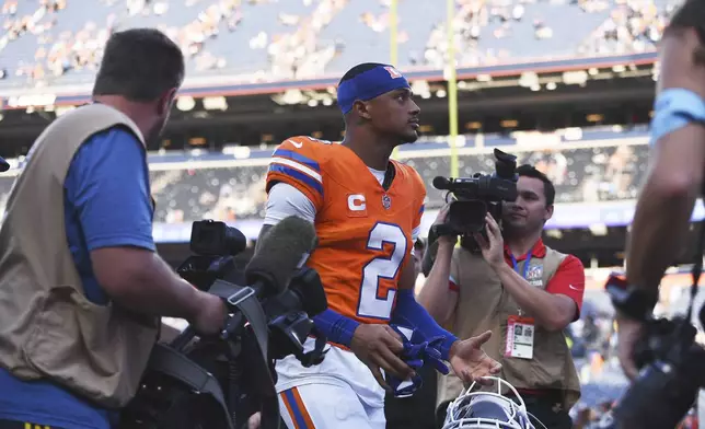 Denver Broncos cornerback Pat Surtain II heads off the field after an NFL football game against the Las Vegas Raiders, Sunday, Oct. 6, 2024, in Denver. (AP Photo/Geneva Heffernan)