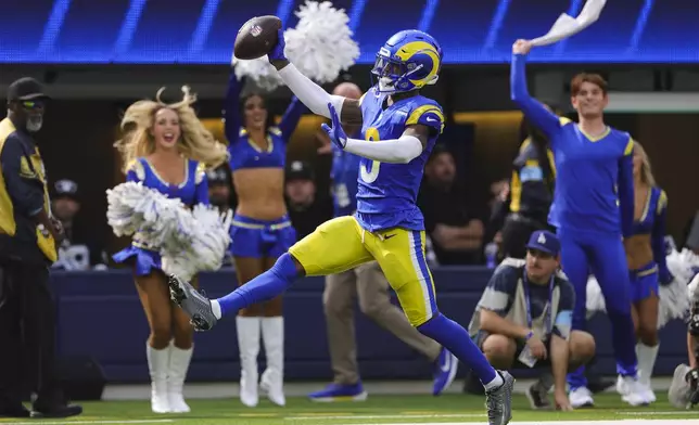 Los Angeles Rams safety Kamren Curl (3) celebrates scoring a defensive touchdown during the first half of an NFL football game against the Las Vegas Raiders, Sunday, Oct. 20, 2024, in Inglewood, Calif. (AP Photo/Ryan Sun)