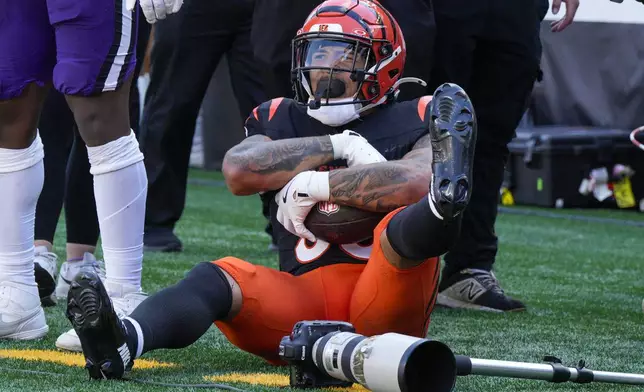 Cincinnati Bengals running back Chase Brown reacts after catching a touchdown pass against the Baltimore Ravens during the second half of an NFL football game, Sunday, Oct. 6, 2024, in Cincinnati. (AP Photo/Jeff Dean)