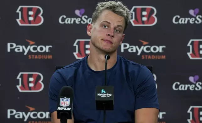 Cincinnati Bengals quarterback Joe Burrow speaks to reporters following an NFL football game against the Baltimore Ravens, Sunday, Oct. 6, 2024, in Cincinnati. The Ravens won 41-38 in overtime. (AP Photo/Jeff Dean)