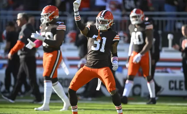 Cleveland Browns cornerback Mike Ford Jr. (31) celebrates a win over the Baltimore Ravens during the second half of an NFL football game in Cleveland, Sunday, Oct. 27, 2024. (AP Photo/David Richard)