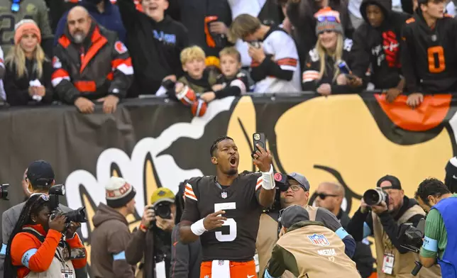 Cleveland Browns quarterback Jameis Winston (5) celebrates after a win against the Baltimore Ravens in an NFL football game in Cleveland, Sunday, Oct. 27, 2024. (AP Photo/David Richard)