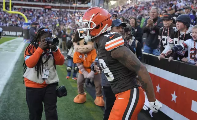 Cleveland Browns wide receiver Cedric Tillman (19) celebrates after a touchdown against the Baltimore Ravens during the second half of an NFL football game in Cleveland, Sunday, Oct. 27, 2024. (AP Photo/Sue Ogrocki)