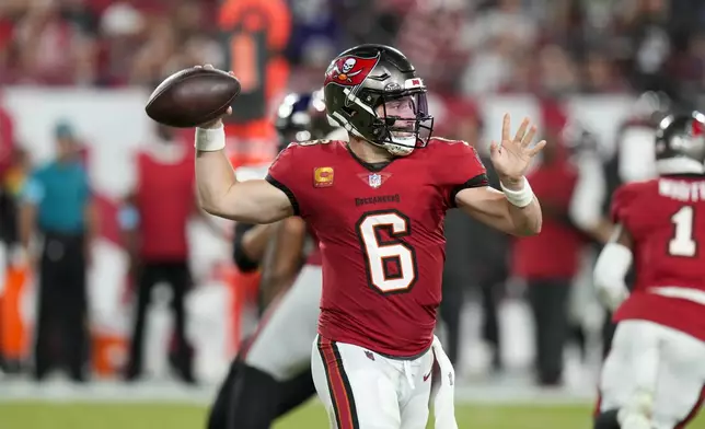 Tampa Bay Buccaneers quarterback Baker Mayfield (6) looks to throw during the second half of an NFL football game against the Baltimore Ravens, Monday, Oct. 21, 2024, in Tampa, Fla. (AP Photo/Chris O'Meara)