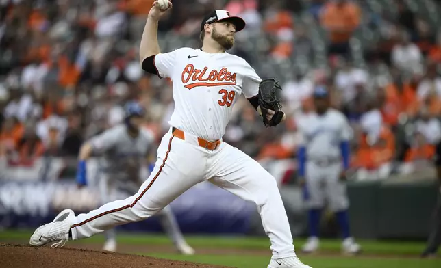 Baltimore Orioles starting pitcher Corbin Burnes throws in the first inning during Game 1 of an AL Wild Card Series baseball game against the Kansas City Royals, Tuesday, Oct. 1, 2024, in Baltimore. (AP Photo/Nick Wass)