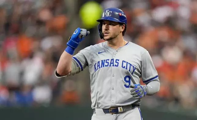 Kansas City Royals' Vinnie Pasquantino reacts after hitting a single against the Baltimore Orioles during the fifth inning in Game 2 of an AL Wild Card Series baseball game, Wednesday, Oct. 2, 2024 in Baltimore. (AP Photo/Stephanie Scarbrough)