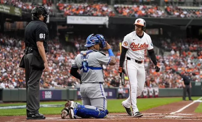 Baltimore Orioles' Jordan Westburg (11) reacts after striking out during the first inning of Game 1 of an AL Wild Card Series baseball game against the Kansas City Royals, Tuesday, Oct. 1, 2024, in Baltimore. (AP Photo/Stephanie Scarbrough)