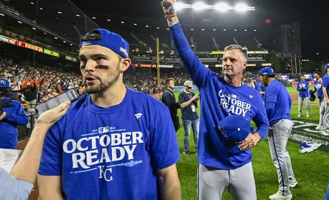 Kansas City Royals manager Matt Quatraro gestures after his team defeated the Baltimore Orioles 2-1 in Game 2 of an AL Wild Card Series baseball game, Wednesday, Oct. 2, 2024 in Baltimore. (AP Photo/Nick Wass)