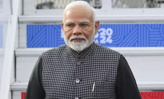 Indian Prime Minister Narendra Modi arrives at Kazan International Airport prior to the BRICS summit in Kazan, Russia, Tuesday, Oct. 22, 2024. (Ilya Pitalev/Photo host brics-russia2024.ru via AP)