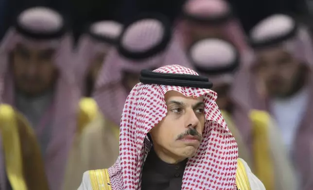 Saudi Arabia's Foreign Minister Prince Faisal bin Farhan Al-Saud attends Outreach/BRICS Plus format session at BRICS summit in Kazan, Russia, Thursday, Oct. 24, 2024. (Vladimir Astapkovich/Photo host brics-russia2024.ru via AP)