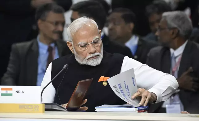 Indian Prime Minister Narendra Modi attends BRICS Summit extended format session in Kazan, Russia, Wednesday, Oct. 23, 2024. (Alexander Nemenov, Pool Photo via AP)