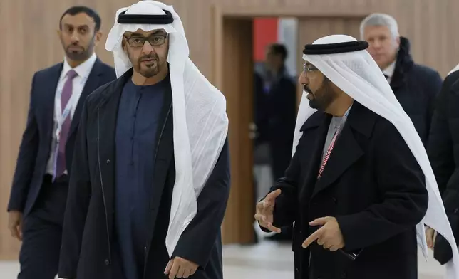 United Arab Emirates President Sheikh Mohammed bin Zayed Al Nahyan, left, arrives at BRICS Summit in Kazan, Russia, Wednesday, Oct. 23, 2024. (Maxim Shemetov, Pool Photo via AP)