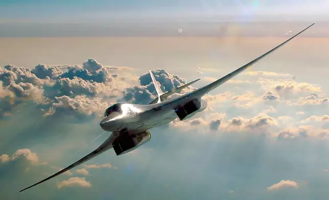 FILE - In this photo released by Russian Defense Ministry Press Service on Tuesday April 13, 2021, a nuclear-capable strategic bomber of the Russian air force is shown on a training mission somewhere in Russia. (Vadim Savitsky/Russian Defense Ministry Press Service via AP, File)