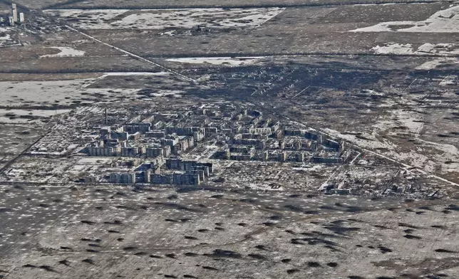 FILE - An aerial view of Vuhledar, the site of heavy battles with the Russian troops in the Donetsk region, Ukraine, Feb. 10, 2023. (AP Photo/Libkos, File)