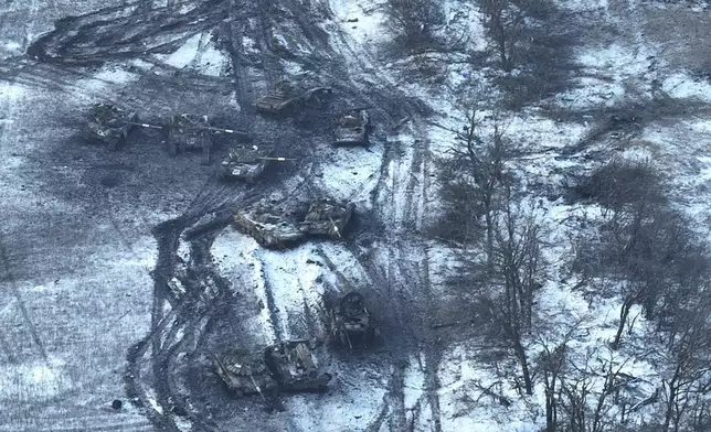 FILE - This image provided by the Ukrainian Armed Forces and taken in February 2023 shows damaged Russian tanks in a field after an attack on Vuhledar, Ukraine. (Ukrainian Armed Forces via AP, File)