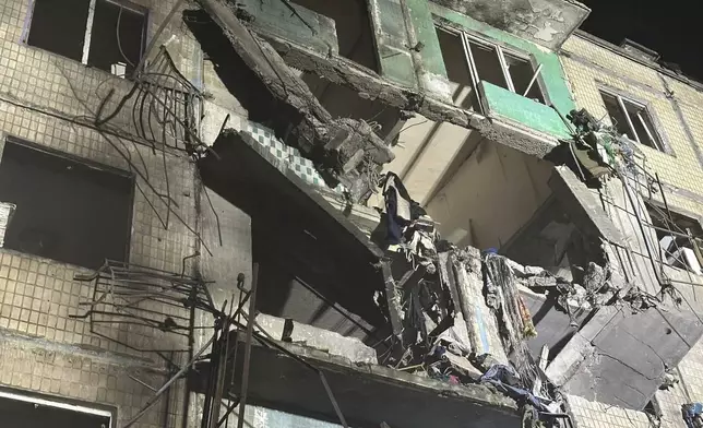 A view of the damage after a Russian strike on a residential building in Kharkiv, Ukraine, late Wednesday Oct. 2, 2024. (Ukrainian National Police via AP)