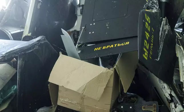 Parts of downed Shahed drones launched by Russia are piled in a storage room of a research laboratory in Kyiv, Ukraine, on Aug. 28, 2024. (AP Photo/Evgeniy Maloletka)