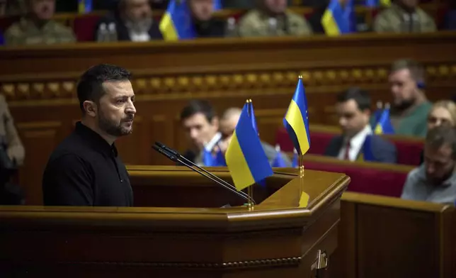 In this photo provided by the Press Service Of The President Of Ukraine on Oct. 16, 2024, Ukraine's President Volodymyr Zelenskyy speaks to parliamentarians at Verkhovna Rada in Kyiv, Ukraine. (Press Service Of The President Of Ukraine via AP)