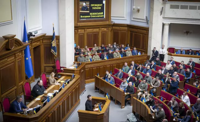 In this photo provided by the Press Service Of The President Of Ukraine on Oct. 16, 2024, Ukraine's President Volodymyr Zelenskyy speaks to parliamentarians at Verkhovna Rada in Kyiv, Ukraine. (Press Service Of The President Of Ukraine via AP)