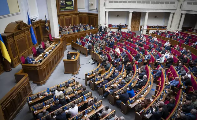 In this photo provided by the Press Service Of The President Of Ukraine on Oct. 16, 2024, Ukraine's President Volodymyr Zelenskyy speaks to parliamentarians at Verkhovna Rada in Kyiv, Ukraine. (Press Service Of The President Of Ukraine via AP)