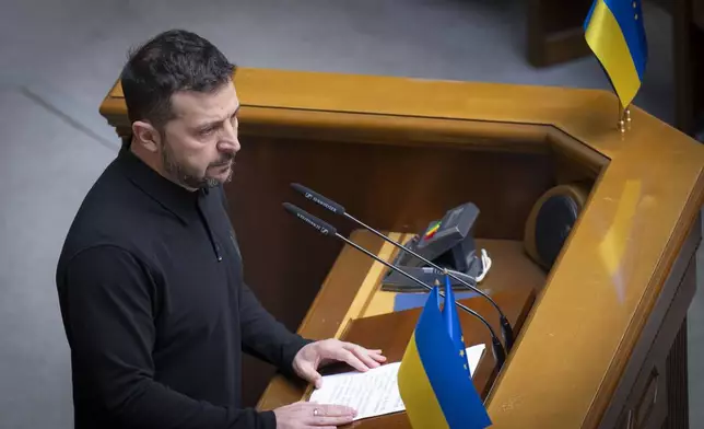 In this photo provided by the Press Service Of The President Of Ukraine on Oct. 16, 2024, Ukraine's President Volodymyr Zelenskyy speaks to parliamentarians at Verkhovna Rada in Kyiv, Ukraine. (Press Service Of The President Of Ukraine via AP)