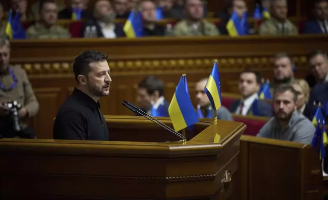 In this photo provided by the Press Service Of The President Of Ukraine on Oct. 16, 2024, Ukraine's President Volodymyr Zelenskyy speaks to parliamentarians at Verkhovna Rada in Kyiv, Ukraine. (Press Service Of The President Of Ukraine via AP)