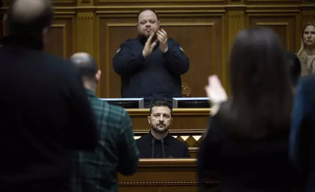 In this photo provided by the Press Service Of The President Of Ukraine on Oct. 16, 2024, Ukraine's President Volodymyr Zelenskyy speaks to parliamentarians at Verkhovna Rada in Kyiv, Ukraine. (Press Service Of The President Of Ukraine via AP)