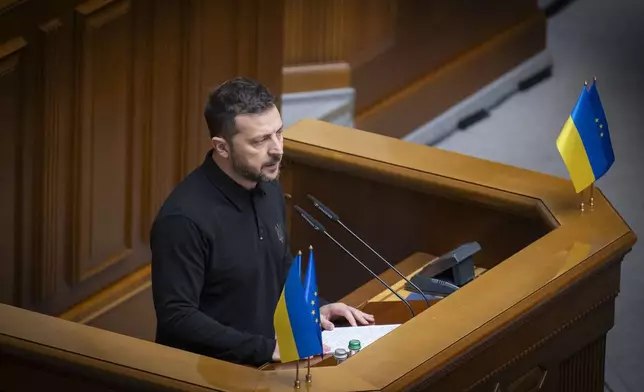 In this photo provided by the Press Service Of The President Of Ukraine on Oct. 16, 2024, Ukraine's President Volodymyr Zelenskyy speaks to parliamentarians at Verkhovna Rada in Kyiv, Ukraine. (Press Service Of The President Of Ukraine via AP)