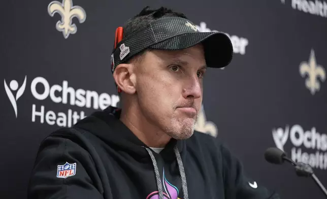 New Orleans Saints head coach Dennis Allen pauses during a news conference following an NFL football game against the Kansas City Chiefs Monday, Oct. 7, 2024, in Kansas City, Mo. The Chiefs won 26-13. (AP Photo/Ed Zurga)