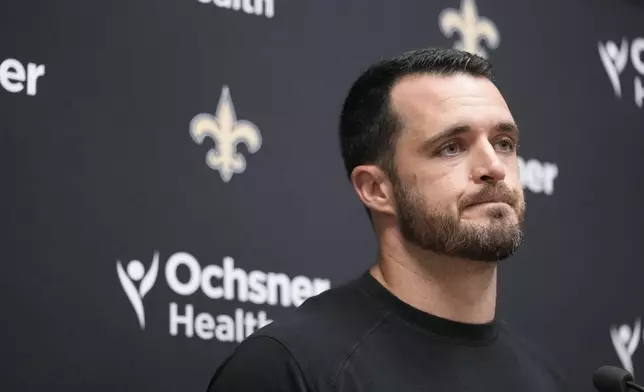 New Orleans Saints quarterback Derek Carr speaks during a news conference following an NFL football game against the Kansas City Chiefs Monday, Oct. 7, 2024, in Kansas City, Mo. (AP Photo/Ed Zurga)