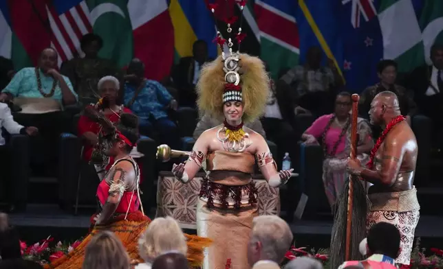 Dancers perform during the opening ceremony for the Commonwealth Heads of Government meeting in Apia, Samoa, Friday, Oct. 25, 2024. (AP Photo/Rick Rycroft/Pool)