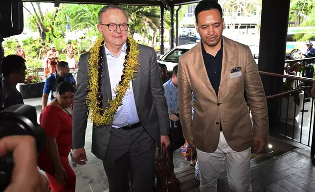 Australia's Prime Minister Anthony Albanese arrives for the Leaders' Retreat during the Commonwealth Heads of Government Meeting (CHOGM) in Apia, Samoa, Saturday, Oct. 26, 2024. (William West/Pool Photo via AP)