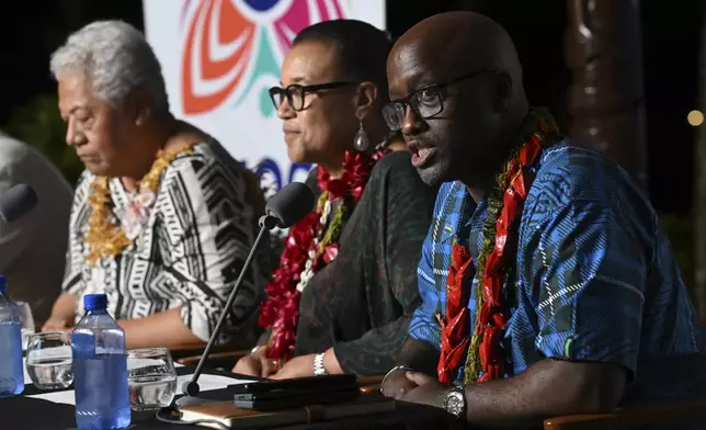 From left, Samoa's Prime Minister Afioga Fiame Naomi Mata'afa, Commonwealth Secretary General Patricia Scotland and Rwanda's Minister of Foreign Affairs Olivier Nduhungirehe attend the final press conference at the Commonwealth Heads of Government Meeting (CHOGM) in Apia, Samoa, Saturday, Oct. 26, 2024. (William West/Pool Photo via AP)