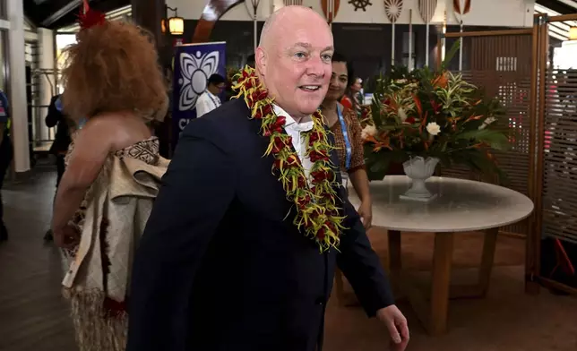 New Zealand's Prime Minister Christopher Luxon arrives for the Leaders' Retreat during the Commonwealth Heads of Government Meeting (CHOGM) in Apia, Samoa, Saturday, Oct. 26, 2024. (William West/Pool Photo via AP)