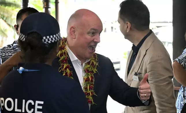 New Zealand's Prime Minister Christopher Luxon arrives for the Leaders' Retreat during the Commonwealth Heads of Government Meeting (CHOGM) in Apia, Samoa, Saturday, Oct. 26, 2024. (William West/Pool Photo via AP)