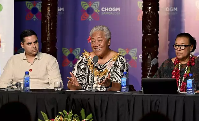 Malta's Minister of Foreign Affairs Ian Borg, left, and Samoa's Prime Minister Afioga Fiame Naomi Mata'afa, center, and Commonwealth Secretary General Patricia Scotland attend the final press conference at the Commonwealth Heads of Government Meeting (CHOGM) in Apia, Samoa, Saturday, Oct. 26, 2024. (William West/Pool Photo via AP)