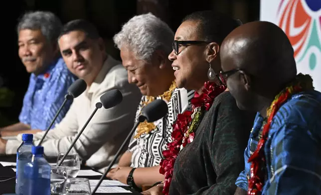 From left to right, Malaysia's Foreign Minister Mohamad Hasan, Malta's Minister of Foreign Affairs Ian Borg, Samoa's Prime Minister Afioga Fiame Naomi Mata'afa, Commonwealth Secretary General Patricia Scotland and Rwanda's Minister of Foreign Affairs Olivier Nduhungirehe attend the final press conference at the Commonwealth Heads of Government Meeting (CHOGM) in Apia, Samoa, Saturday, Oct. 26, 2024. (William West/Pool Photo via AP)