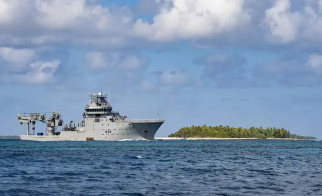 In this image released by New Zealand Defence Force (NZDF), HMNZS Manawanui arrives in Funafuti Lagoon, Tuvalu, on Sept. 7, 2022. (PO Christopher Weissenborn/NZDF via AP)