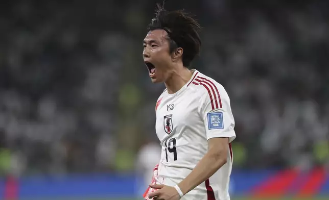 Japan's Koki Ogawa celebrates during the World Cup 2026 qualifier soccer match between Japan and Saudi Arabia at the King Abdullah Sports City, in Jeddah, Saudi Arabia, Thursday, Oct. 10, 2024. (AP Photo)