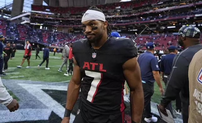 Atlanta Falcons running back Bijan Robinson (7) walks off the field after an NFL football game, Sunday, Oct. 20, 2024, in Atlanta. (AP Photo/Brynn Anderson)