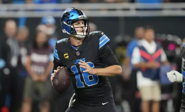 Detroit Lions quarterback Jared Goff prepares to throw during the second half of an NFL football game against the Seattle Seahawks, Monday, Sept. 30, 2024, in Detroit. (AP Photo/Paul Sancya)