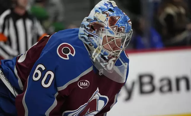 Colorado Avalanche goaltender Justus Annunen waits for play to resume in the second period of an NHL hockey game against the Ottawa Senators, Sunday, Oct. 27, 2024, in Denver. (AP Photo/David Zalubowski)