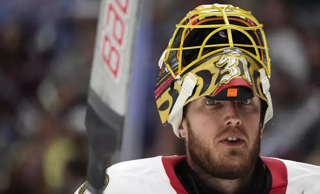 Ottawa Senators goaltender Anton Forsberg waits for play to resume in the first period of an NHL hockey game against the Colorado Avalanche, Sunday, Oct. 27, 2024, in Denver. (AP Photo/David Zalubowski)