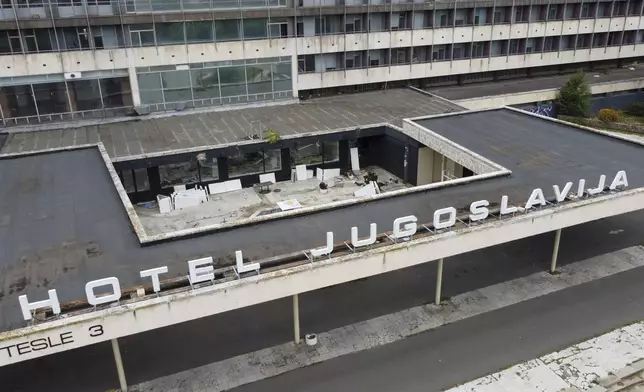 A view of Hotel Yugoslavia, once a symbol of progress in the former socialist state of Yugoslavia that broke apart in the 1990s and a favorite gathering place for local residents as well as world leaders, in Belgrade, Serbia, Thursday, Oct. 3, 2024. (AP Photo/Darko Vojinovic)