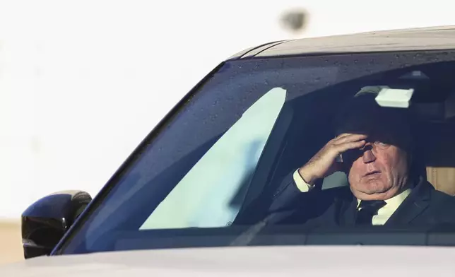 James Jacobson leaves in a vehicle outside of the federal courthouse after his arraignment on sex trafficking and interstate prostitution charges connected to the former CEO of Abercrombie &amp; Fitch, Friday, Oct. 25, 2024, in Central Islip, N.Y. (AP Photo/Heather Khalifa)