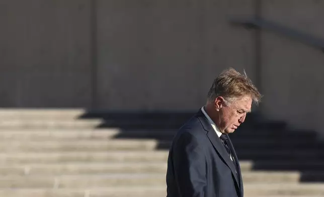 James Jacobson exits the federal courthouse after his arraignment on sex trafficking and interstate prostitution charges connected to the former CEO of Abercrombie &amp; Fitch, Friday, Oct. 25, 2024, in Central Islip, N.Y. (AP Photo/Heather Khalifa)