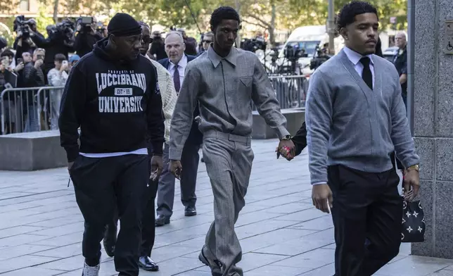 King Combs, center, arrives at Manhattan federal court, Thursday, Oct. 10 2024, in New York. (AP Photo/Yuki Iwamura)