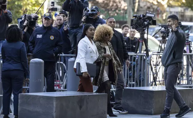 Janice Combs, right, mother of Sean "Diddy Combs, arrives at Manhattan federal court, Thursday, Oct. 10 2024, in New York. (AP Photo/Yuki Iwamura)