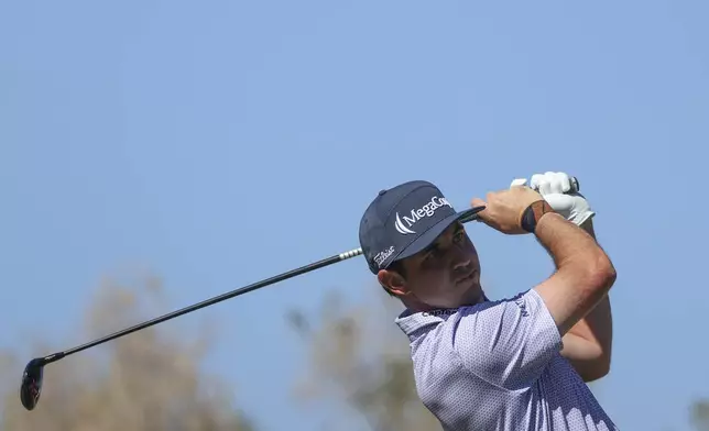 J.T. Poston hits off the tee on the fourth hole during the final round of the Shriners Children's Open golf tournament, Sunday, Oct. 20, 2024, in Las Vegas. (AP Photo/Ian Maule)