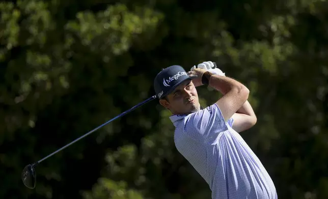 J.T. Poston hits off the tee on the third hole during the final round of the Shriners Children's Open golf tournament, Sunday, Oct. 20, 2024, in Las Vegas. (AP Photo/Ian Maule)